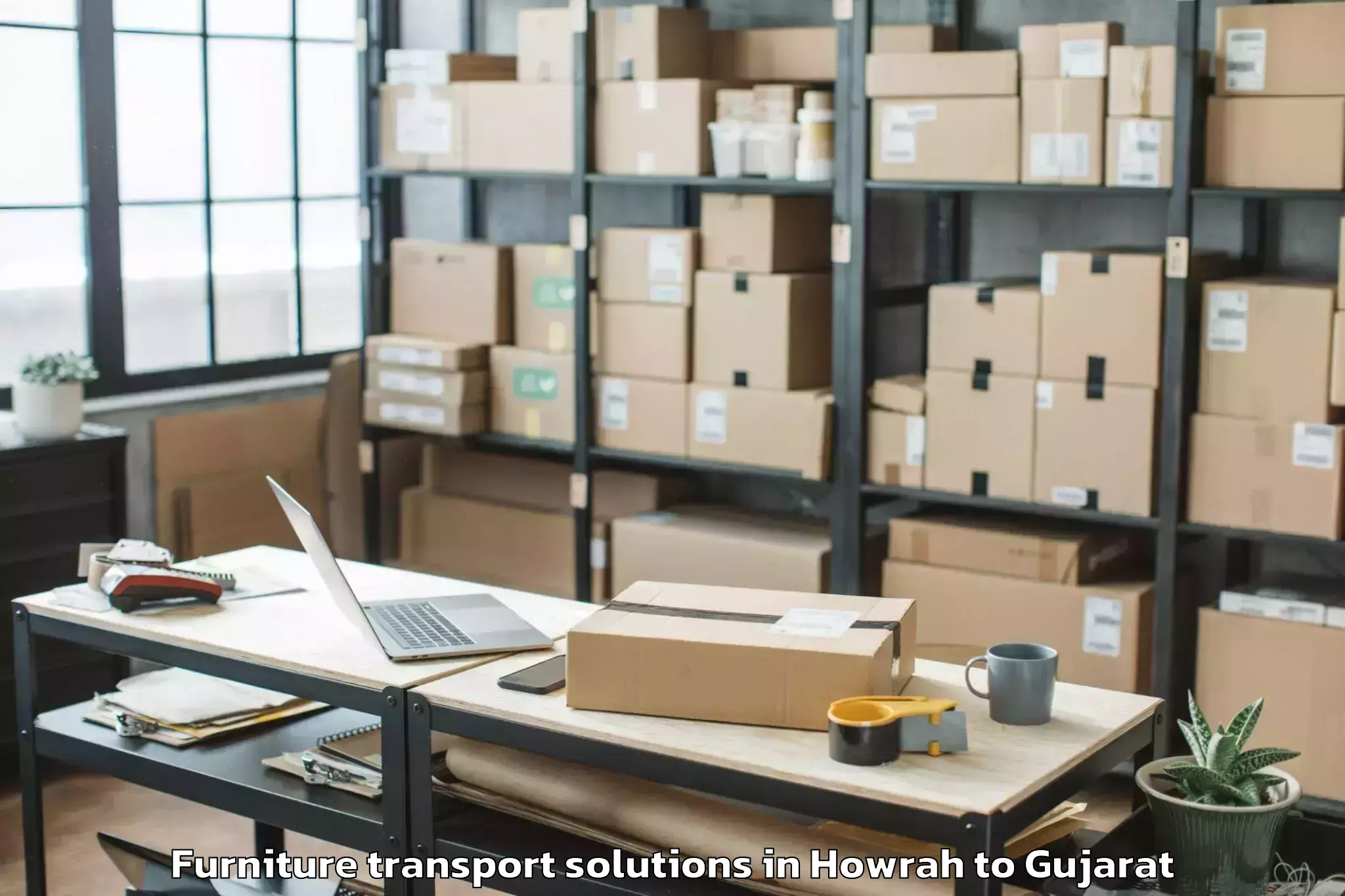 Book Howrah to Wankaner Furniture Transport Solutions Online